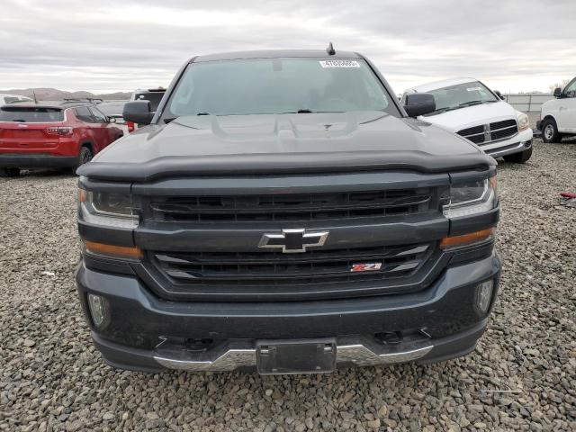 Photo 5 from auction – 2018 CHEVROLET SILVERADO with VIN 3GCUKREC1JG244045