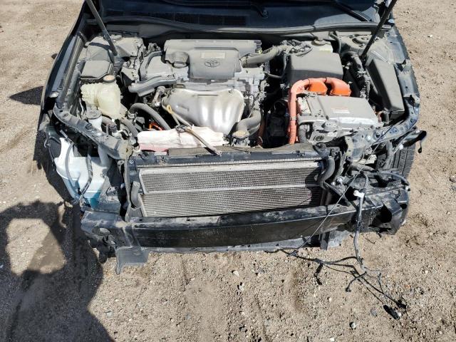 Photo 11 from auction – 2015 TOYOTA CAMRY HYBR with VIN 4T1BD1FK3FU143968