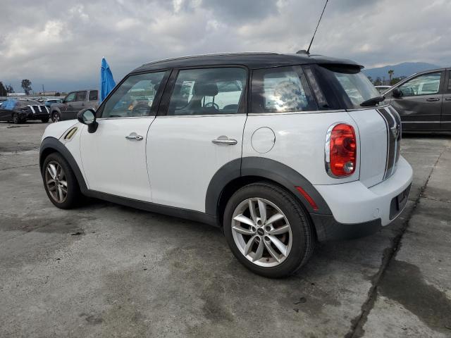 Снимка 2 от търг – 2011 MINI COOPER COU с VIN WMWZB3C53BWM00478
