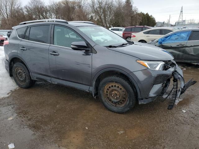 Photo 4 from auction – 2018 TOYOTA RAV4 LE with VIN 2T3BFREV1JW776795