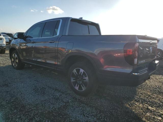 Photo 2 from auction – 2020 HONDA RIDGELINE with VIN 5FPYK3F57LB029557