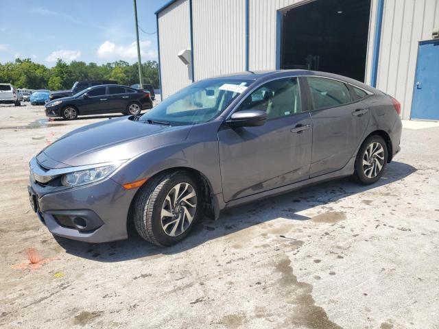 HONDA CIVIC EX 2018 with VIN 2HGFC2F81JH535766 - Photo from auction