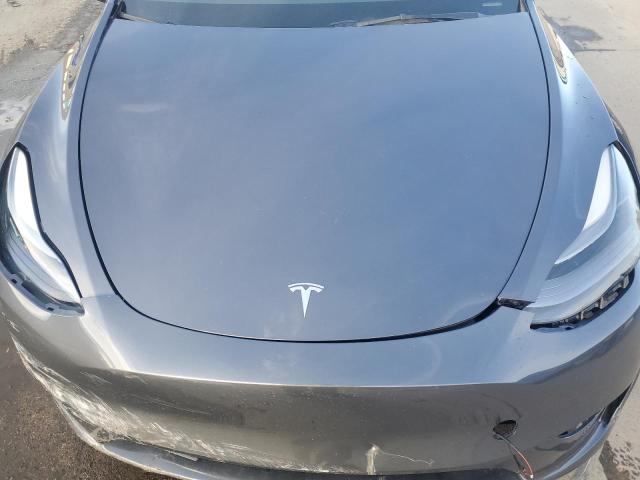 Снимка 12 от търг – 2023 TESLA MODEL Y с VIN 7SAYGDEF2PF865408