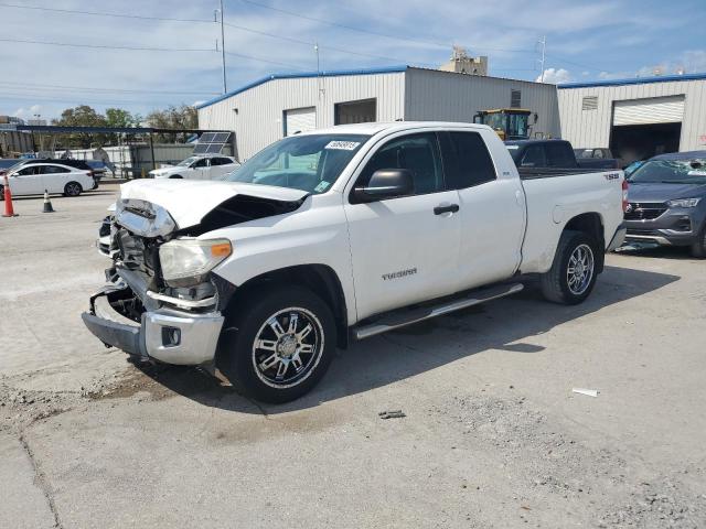 TOYOTA TUNDRA DOU 2014 with VIN 5TFRM5F10EX069018 - Photo from auction