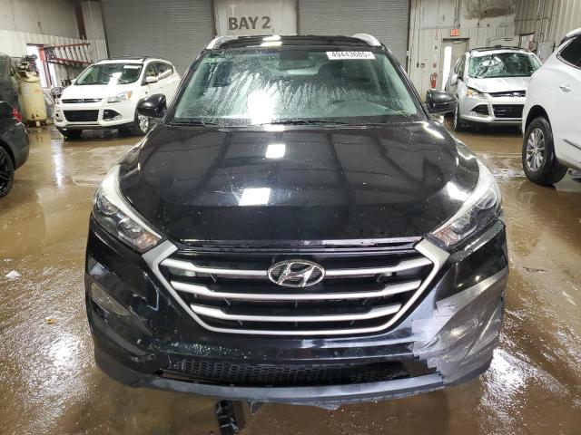 Photo 5 from auction – 2018 HYUNDAI TUCSON SEL with VIN KM8J3CA41JU640089