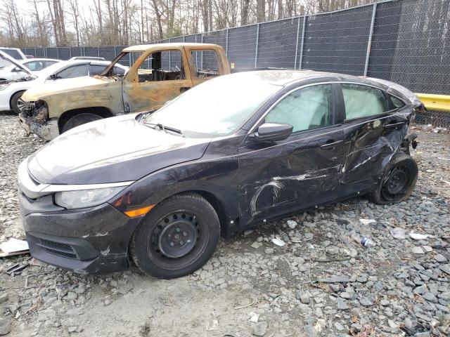 HONDA CIVIC LX 2018 with VIN 19XFC2F52JE020369 - Photo from auction