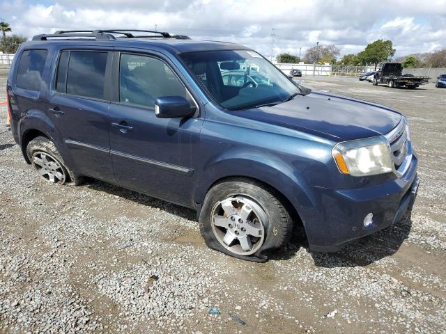 Фото 4 с аукциона – 2011 HONDA PILOT TOUR с VIN 5FNYF4H95BB100952