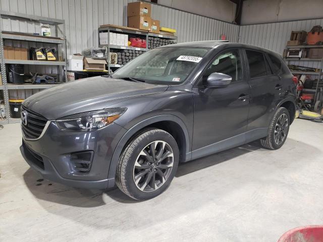 MAZDA CX-5 GT 2016 с VIN JM3KE4DY4G0655152 - Снимка от търг