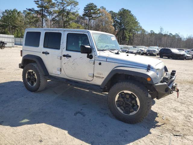 Photo 4 from auction – 2011 JEEP WRANGLER U with VIN 1J4BA5H13BL562938