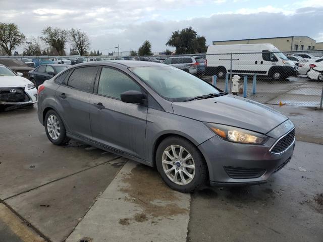 Photo 4 from auction – 2014 FORD FOCUS S with VIN 1FADP3E21EL421150