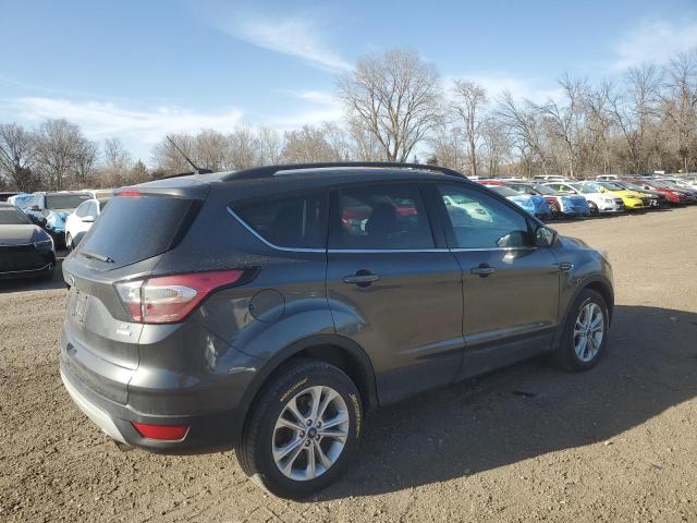 Photo 3 from auction – 2018 FORD ESCAPE SE with VIN 1FMCU0GD8JUD23213