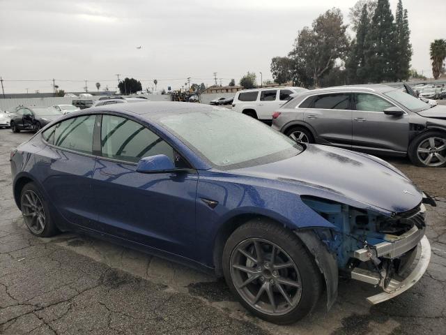 Снимка 4 от търг – 2023 TESLA MODEL 3 с VIN 5YJ3E1EA3PF431448
