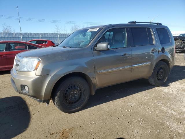 HONDA PILOT TOUR 2010 with VIN 5FNYF4H96AB504745 - Photo from auction
