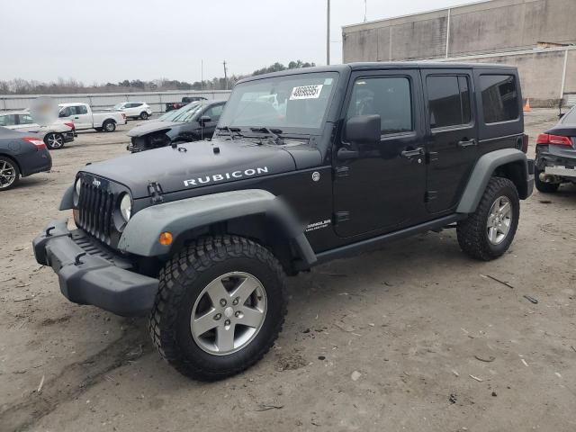 JEEP WRANGLER U 2011 with VIN 1J4BA6H1XBL580097 - Photo from auction