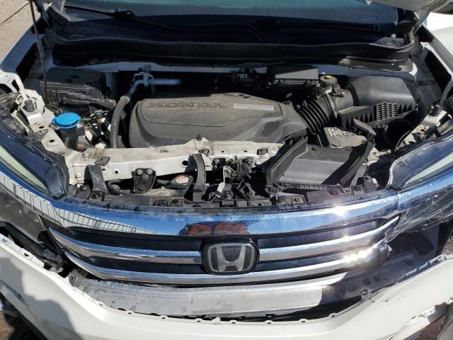 Photo 12 from auction – 2017 HONDA PILOT TOUR with VIN 5FNYF6H91HB007611