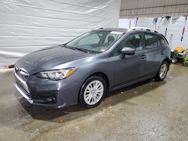 SUBARU IMPREZA PR 2018 with VIN 4S3GTAB65J3710329 - Photo from auction