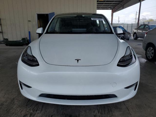 Photo 5 from auction – 2023 TESLA MODEL Y with VIN 7SAYGDEE3PF597797