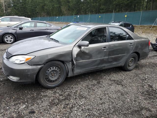 TOYOTA CAMRY LE 2003 with VIN 4T1BE30K23U666427 - Photo from auction