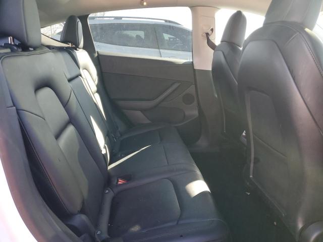 Photo 11 from auction – 2022 TESLA MODEL Y with VIN 7SAYGDEE8NF422717
