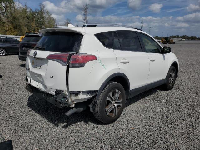 Photo 3 from auction – 2016 TOYOTA RAV4 LE with VIN JTMZFREV4GJ091972