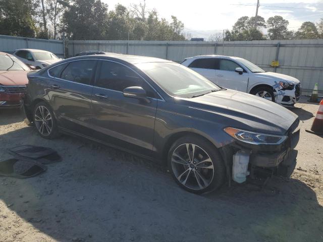 Photo 4 from auction – 2019 FORD FUSION TIT with VIN 3FA6P0D92KR187118