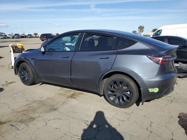 Снимка 2 от търг – 2023 TESLA MODEL Y с VIN 7SAYGDEE6PF637757