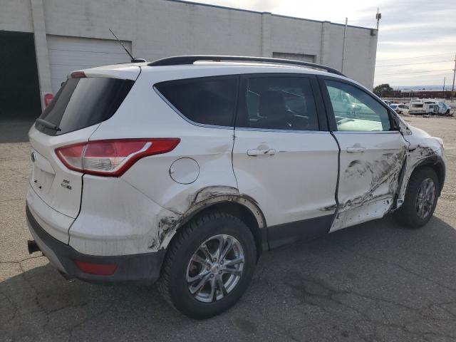 Photo 3 from auction – 2014 FORD ESCAPE SE with VIN 1FMCU9G99EUE35864
