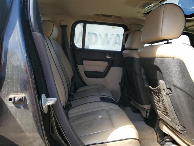 Photo 11 from auction – 2006 HUMMER H3 with VIN 5GTDN136068131344