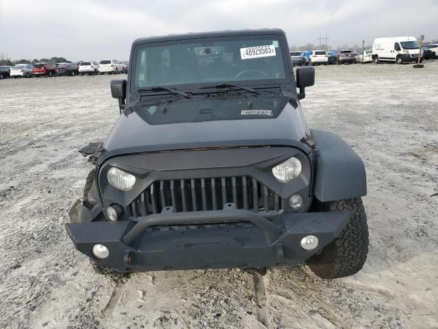 Photo 5 from auction – 2014 JEEP WRANGLER U with VIN 1C4BJWDG0EL227839