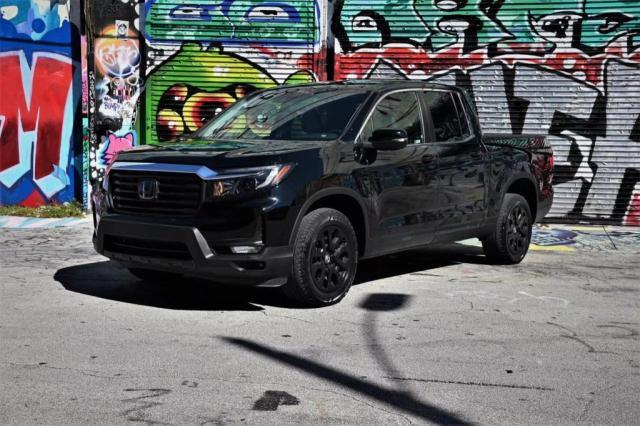 Photo 2 from auction – 2023 HONDA RIDGELINE with VIN 5FPYK3F54PB034057