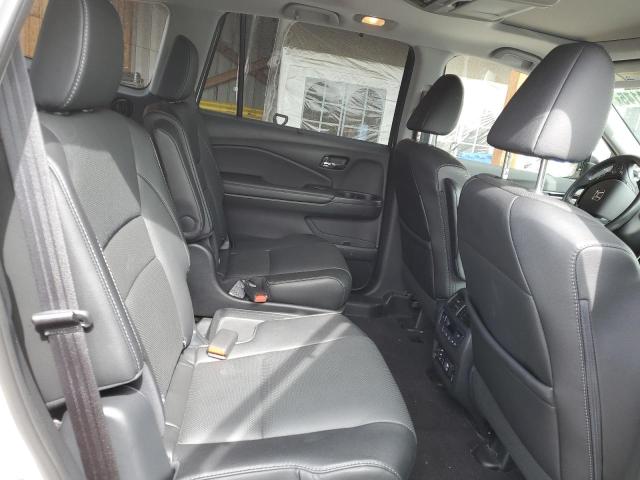 Photo 11 from auction – 2017 HONDA PILOT ELIT with VIN 5FNYF6H09HB019359