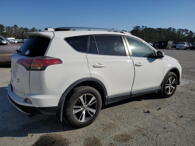 Photo 3 from auction – 2017 TOYOTA RAV4 XLE with VIN JTMRFREV7HJ125890