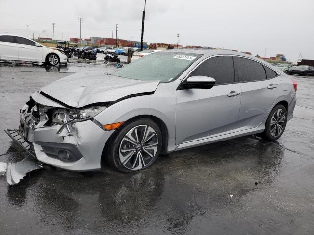 Photo 1 from auction – 2018 HONDA CIVIC EX with VIN JHMFC1F38JX042920