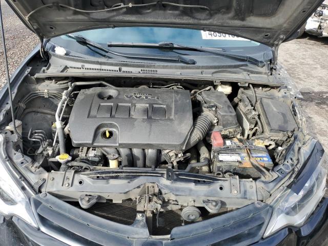 Photo 11 from auction – 2014 TOYOTA COROLLA L with VIN 2T1BURHEXEC177153