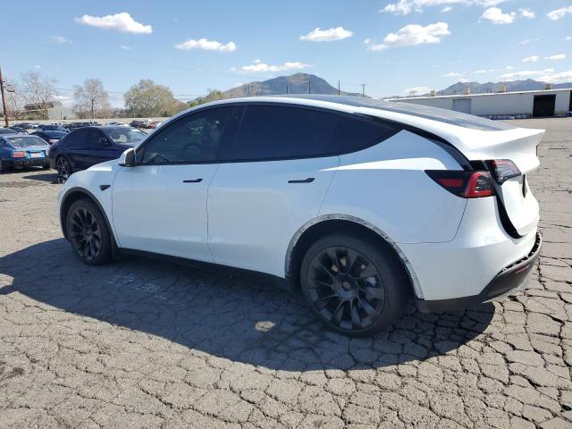 Снимка 2 от търг – 2022 TESLA MODEL Y с VIN 7SAYGAEE7NF539249