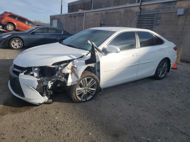 TOYOTA CAMRY LE 2016 with VIN 4T1BF1FK0GU227158 - Photo from auction