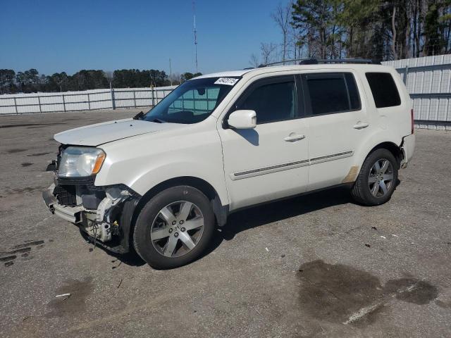 HONDA PILOT TOUR 2014 with VIN 5FNYF4H95EB033189 - Photo from auction