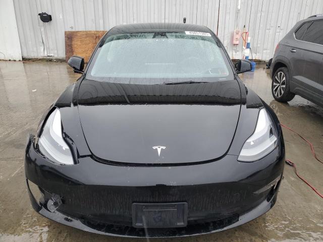 Снимка 5 от търг – 2023 TESLA MODEL 3 с VIN 5YJ3E1EA1PF398529
