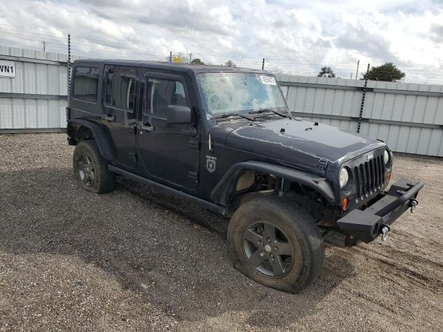 Photo 4 from auction – 2011 JEEP WRANGLER U with VIN 1J4BA6H16BL565337