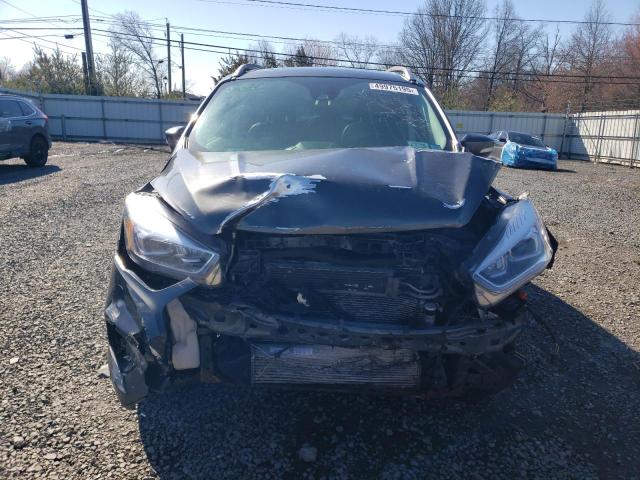 Photo 5 from auction – 2018 FORD ESCAPE TIT with VIN 1FMCU9J95JUB92461