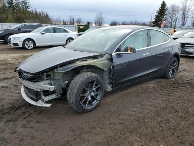 Снимка 1 от търг – 2018 TESLA MODEL 3 с VIN 5YJ3E1EB0JF107910