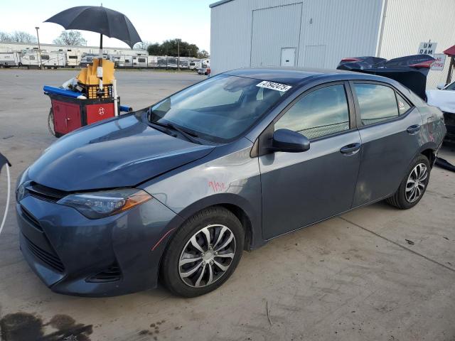 TOYOTA COROLLA L 2017 with VIN 2T1BURHE1HC877874 - Photo from auction