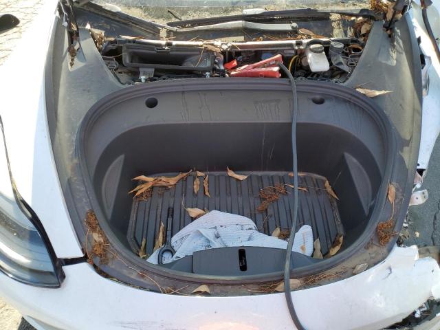 Photo 11 from auction – 2022 TESLA MODEL 3 with VIN 5YJ3E1EB3NF360497