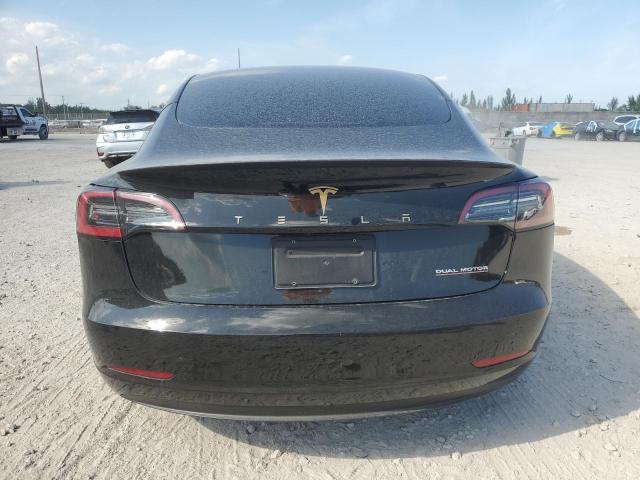 Снимка 6 от търг – 2023 TESLA MODEL 3 с VIN 5YJ3E1ECXPF693419