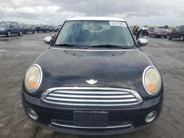 Снимка 5 от търг – 2009 MINI COOPER с VIN WMWMF33599TW74147