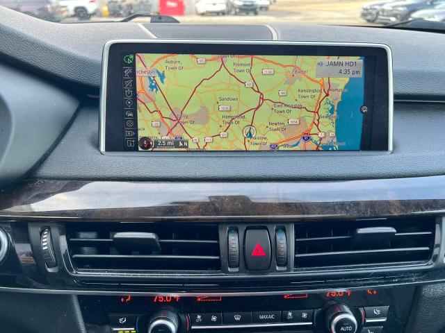 Photo 9 from auction – 2015 BMW X5 XDRIVE4 with VIN 5UXKR0C56F0P07620