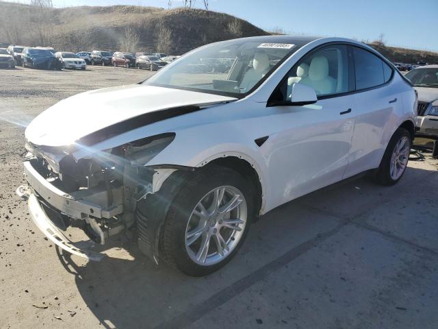 TESLA MODEL Y 2022 with VIN 7SAYGDEE8NF515141 - Photo from auction