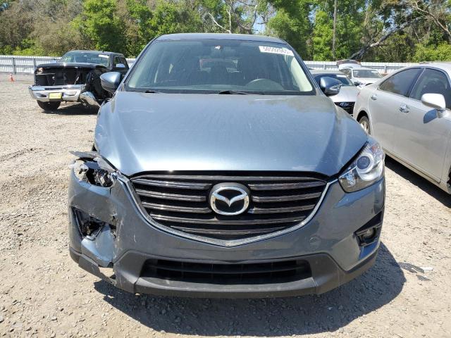 Photo 5 from auction – 2016 MAZDA CX-5 TOURI with VIN JM3KE2CY0G0894283