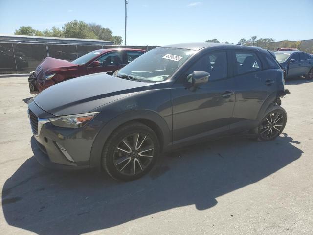 Снимка 1 от търг – 2017 MAZDA CX-3 TOURI с VIN JM1DKDC73H0172403