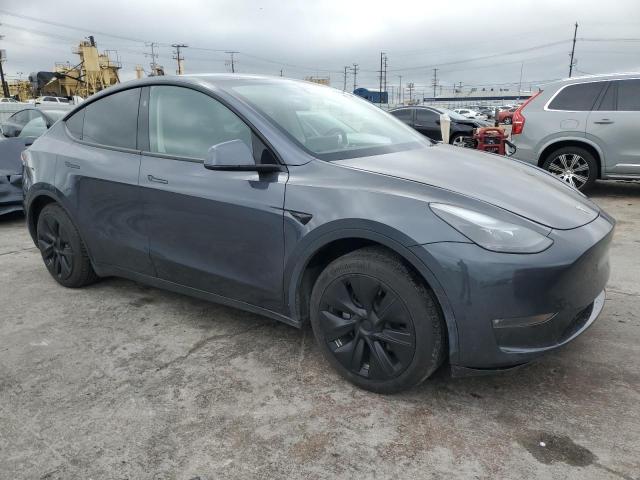 Photo 4 from auction – 2023 TESLA MODEL Y with VIN 7SAYGDED2PF949131